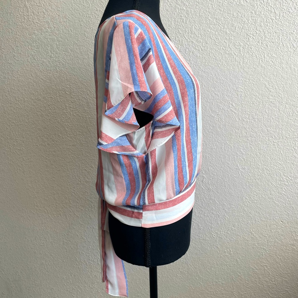 Flutter Sleeve Tie Back Cropped Junior's Top (Multi
Distressed Stripe) - Picture 4 of 13